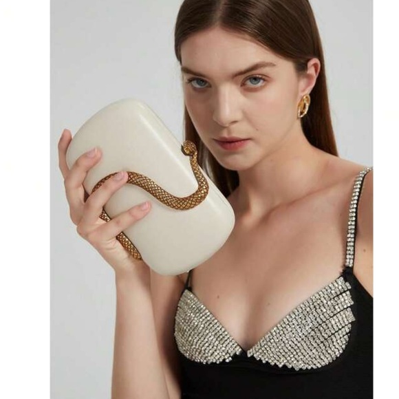 Elegant WhitenClutch with Gold Snake Accent